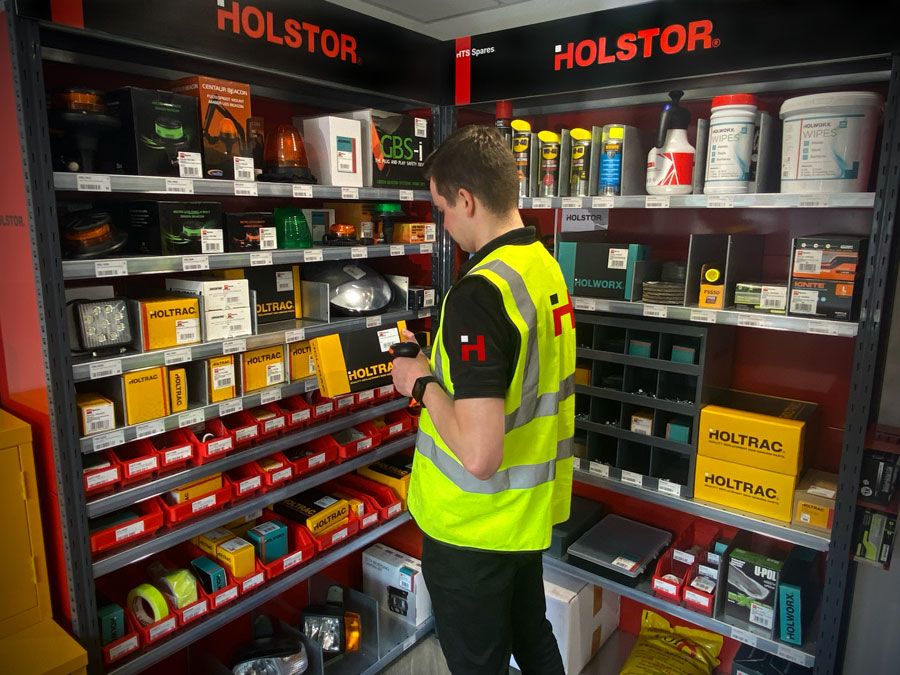 Stock being scanned with a barcode scanner as part of the Holstor system.